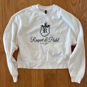 Divided White Crew Neck Sweater with Black Crest Design